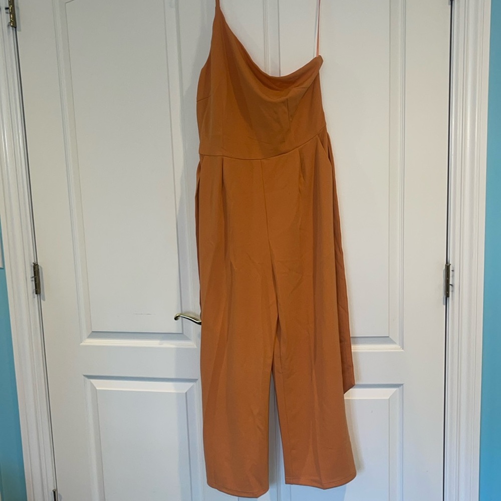 Cutest one shoulder orange jumpsuit! Brand new with tags!
